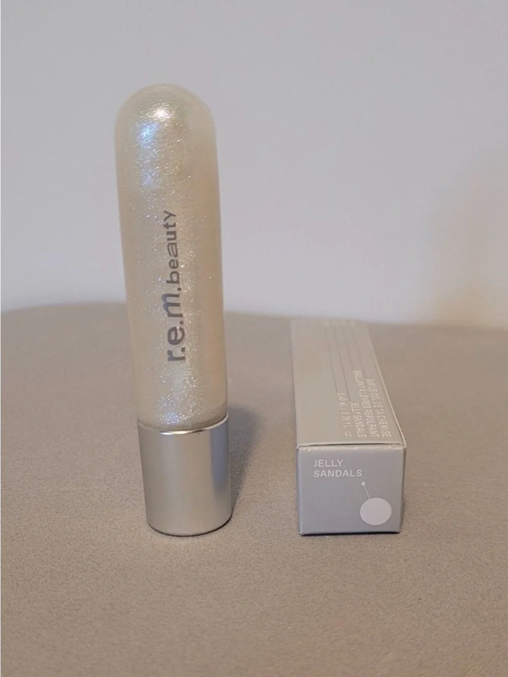 r.e.m. beauty On Your Collar Plumping Gloss Shade: Jelly Sandals